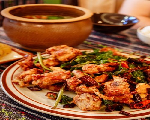 Thai home-cooked meal on a family dining table